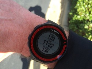 The Garmin Forerunner 220 on my right wrist during my run.